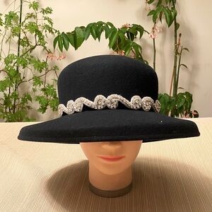 Elegant Black Hat with Silver Embellishment